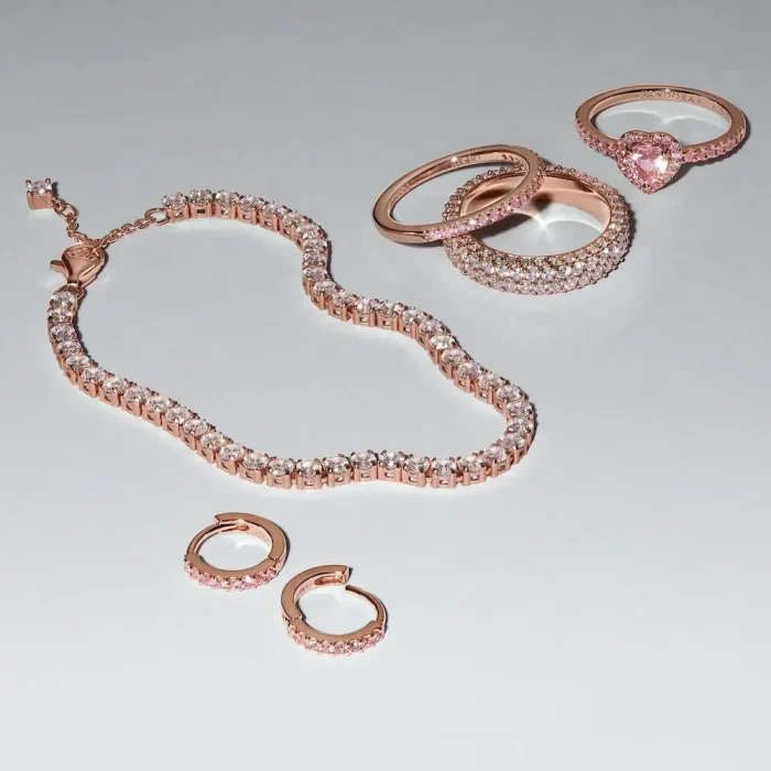 Sparkling Pink Huggie Hoop Earrings - Image 4